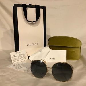 GUCCI ... Round-frame gold metal sunglasses